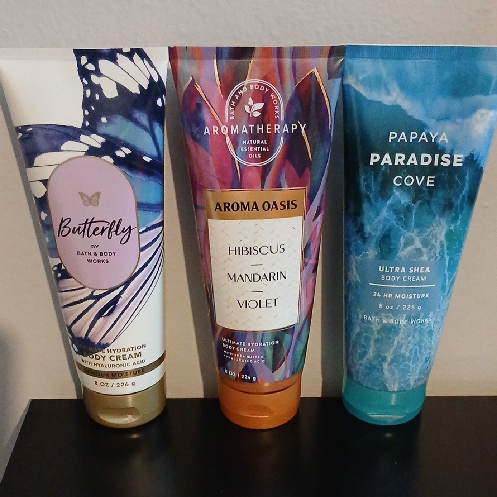 Bath & Body Works Purple and Orange Moisturizer Set